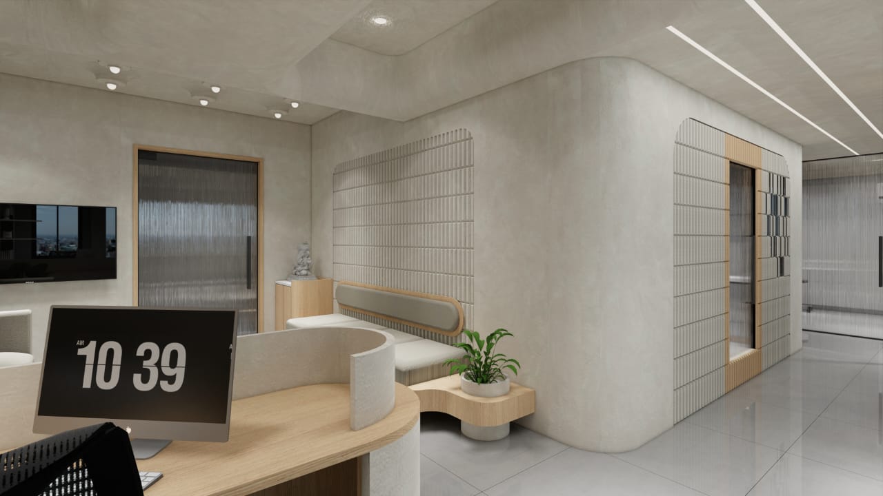 Reception desk area with curved walls and tile accents